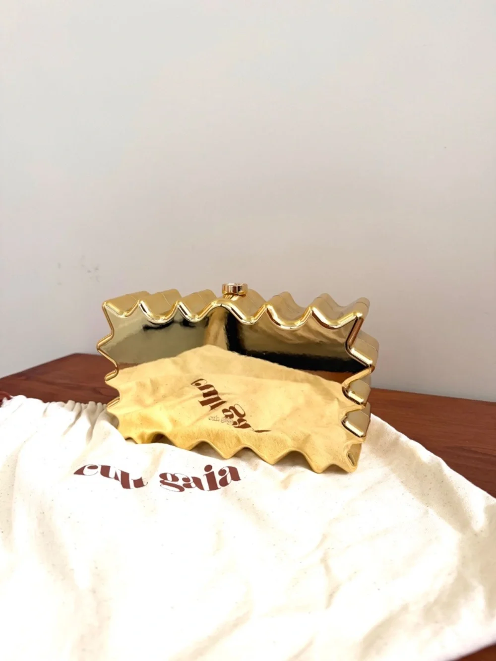 Gold Cult Gaia clutch